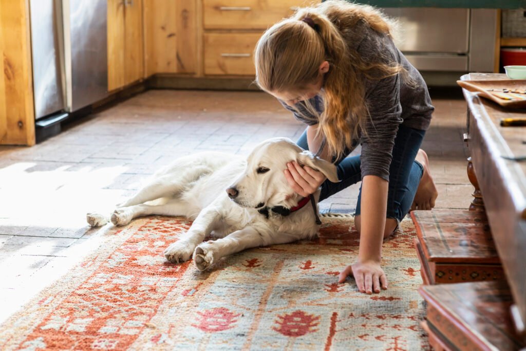 pet and owner on a washable rug